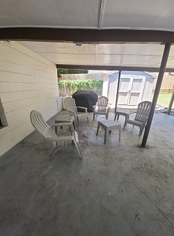 The porch of an air bnb that has been cleaned.